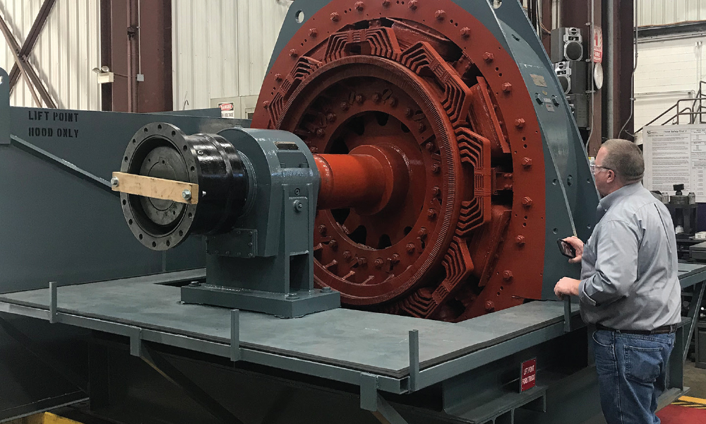 HECO technician testing a large AC electric motor to ensure a complete repair.