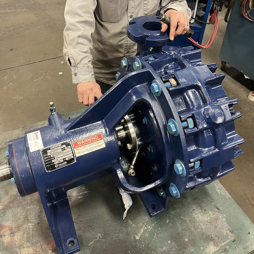 HECO technician working on pump