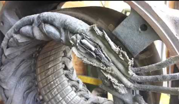 Frayed insulation on an electric motor's windings