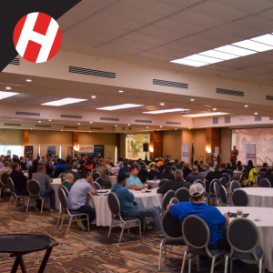 RPM attendees sitting in a conference room listening to the kickoff speaker.
